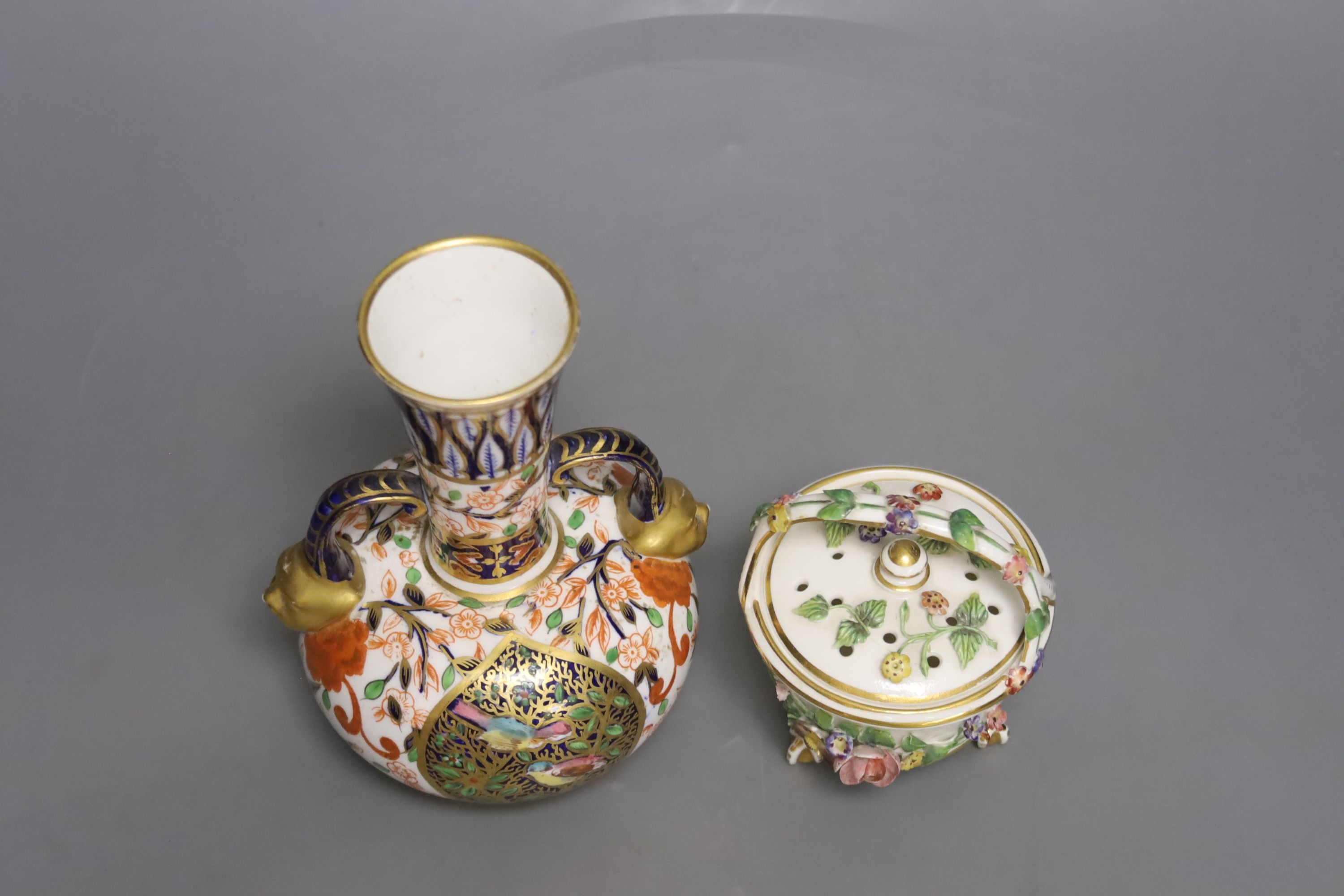 A Royal Crown Derby vase, with two mask head handles painted in Imari style, date code for 1882 and a Derby King Street pot pourri basket and cover c.1900, tallest 16cm